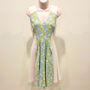 Floral and cream colored Cap sleeved dress